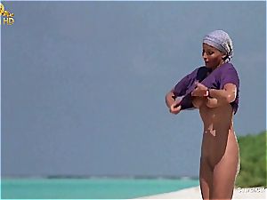 stunning Bo Derek showing off her fur covered vulva at the beach